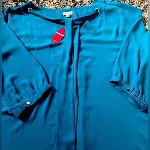 Brand new blouse that has never been worn with the tags still attached